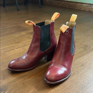 Stylish Burgundy Ankle Boots with Orange Accents